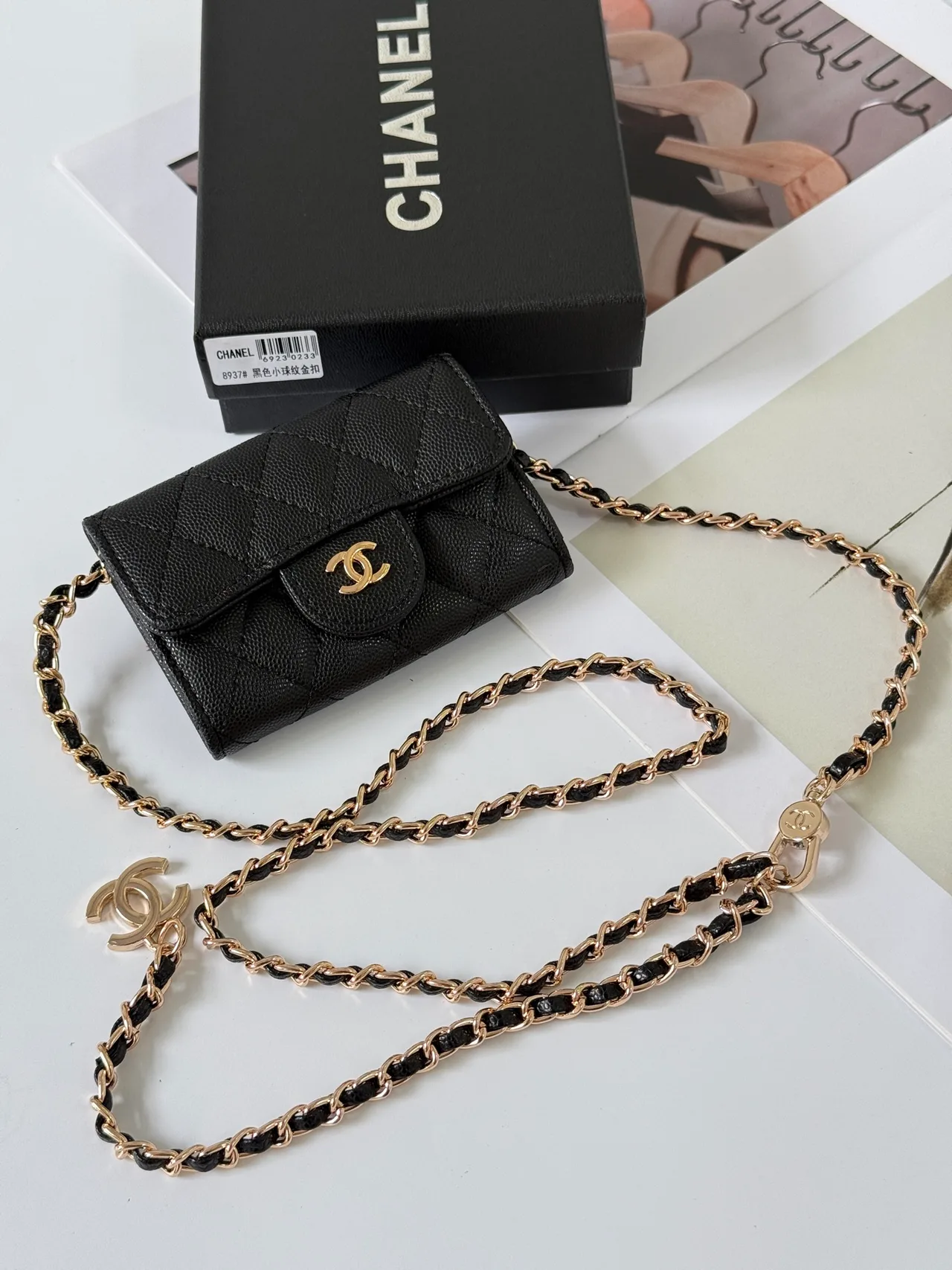 Chanel Quilted Mini Chain Wallet in Black · view 1