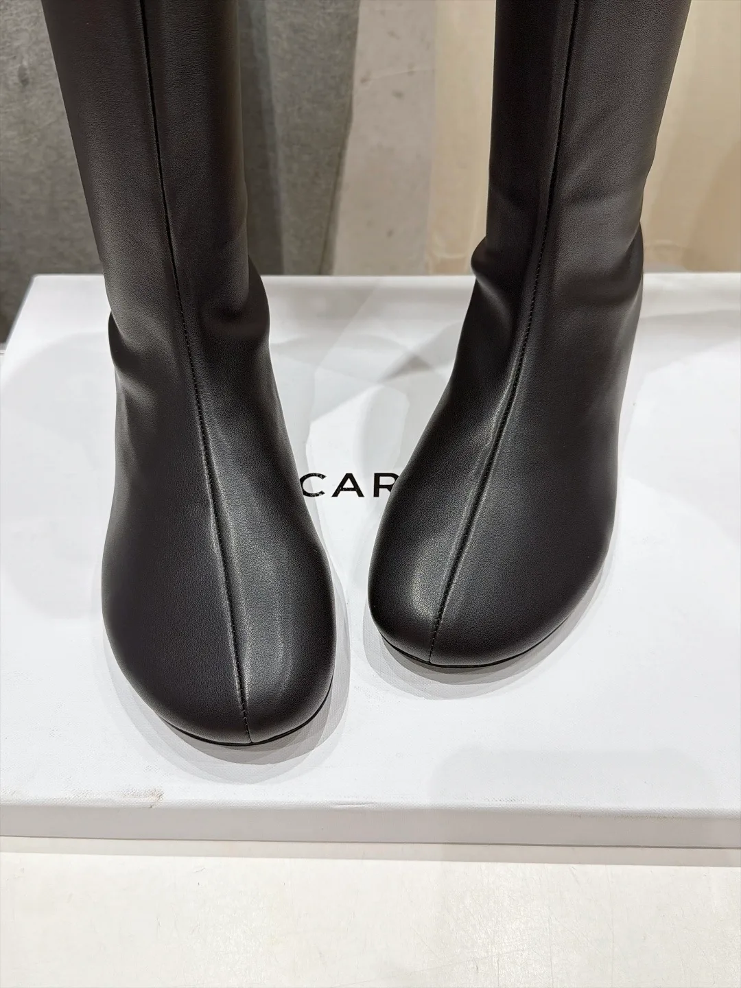 Silk Glossy Round-Toe Minimal Knee-High Boots in Black · view 6