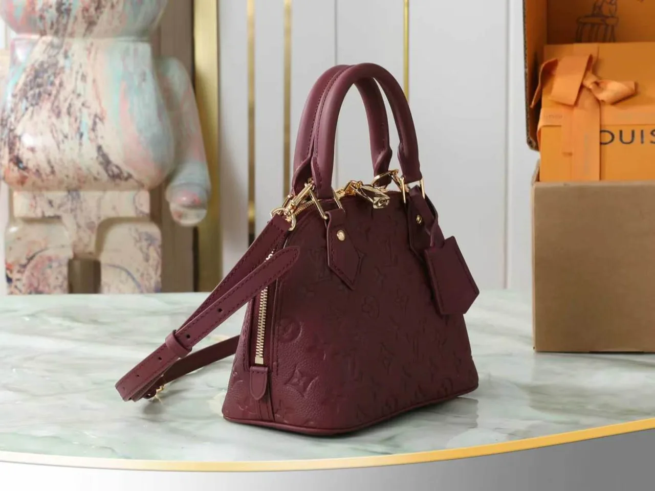 Louis Vuitton Leather Quilted Top-Handle Bag in Burgundy · view 2