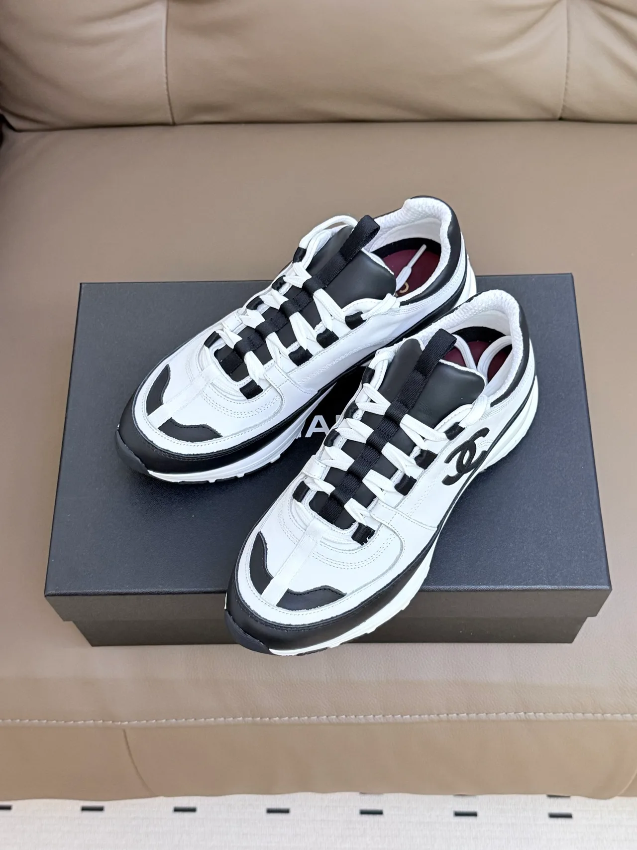 Chanel Cowhide Sheepskin Sneakers in White · view 2