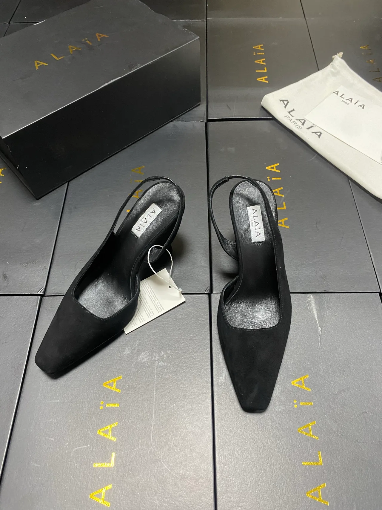 Alaia Square-Toe Slingback Pumps in Black · view 2