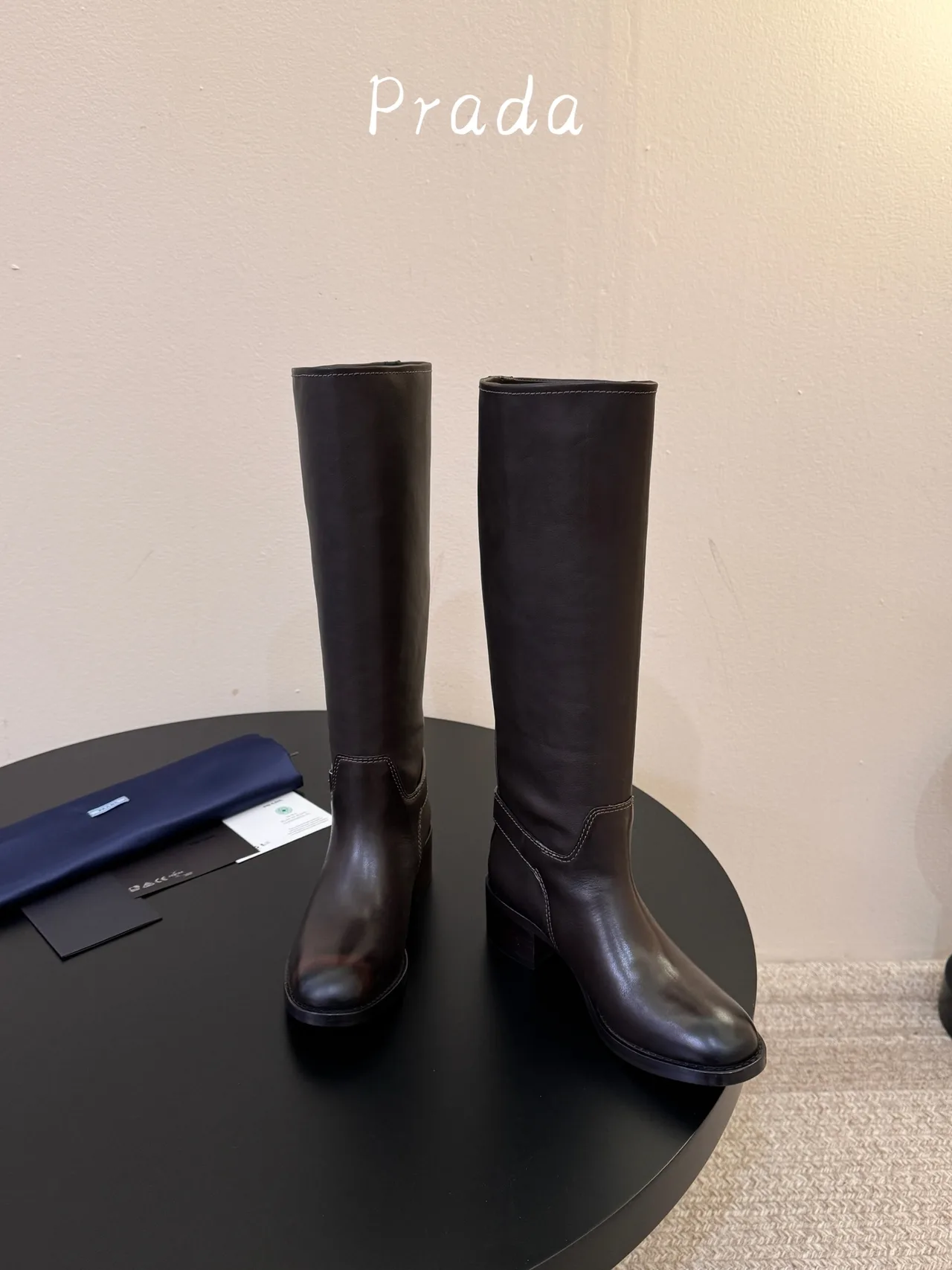 Prada Cowhide Glossy Pointed-Toe Buckle Knee-High Boots in Brown · view 2