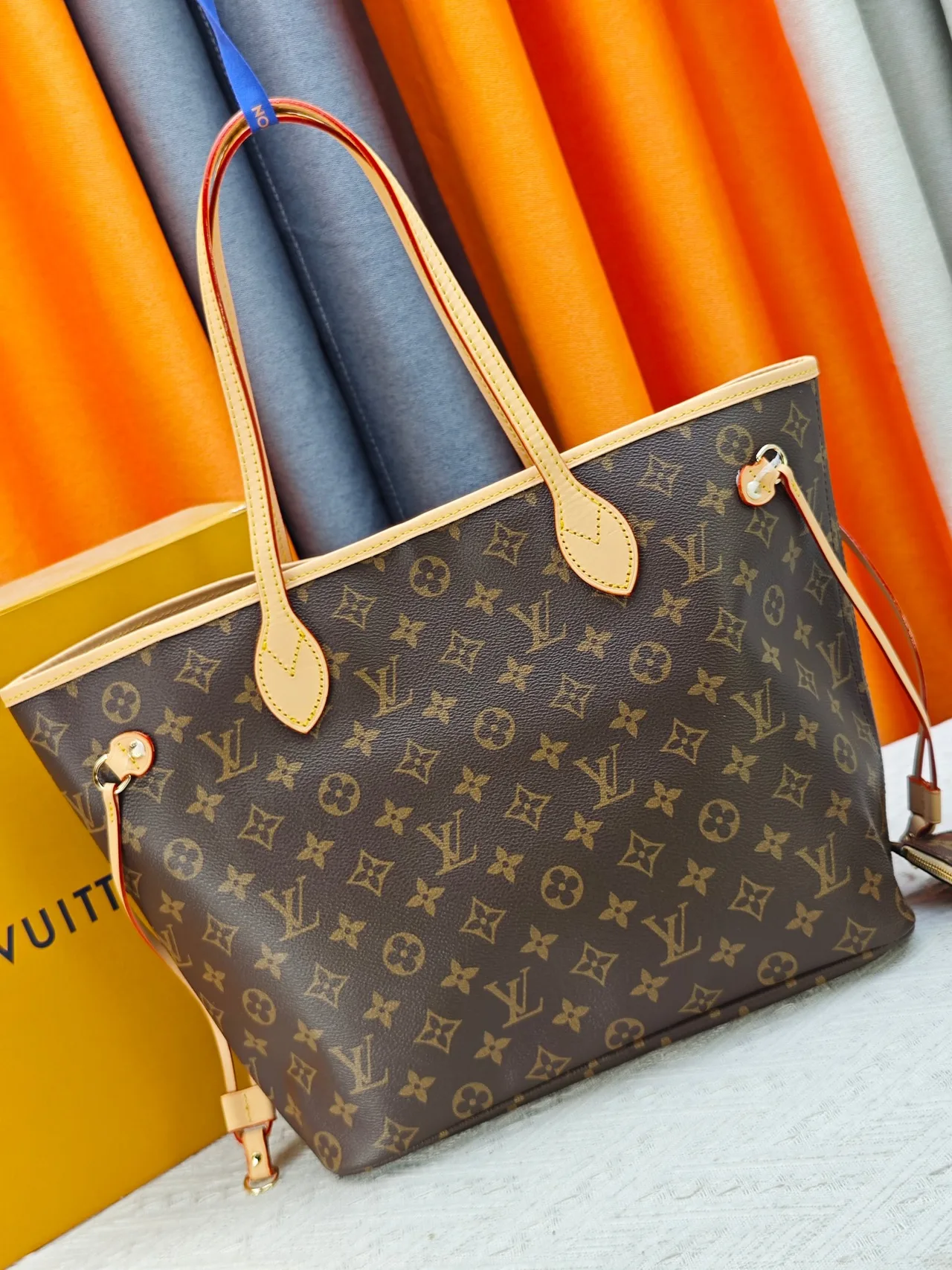 Louis Vuitton Neverfull Clutch in Brown · view 3