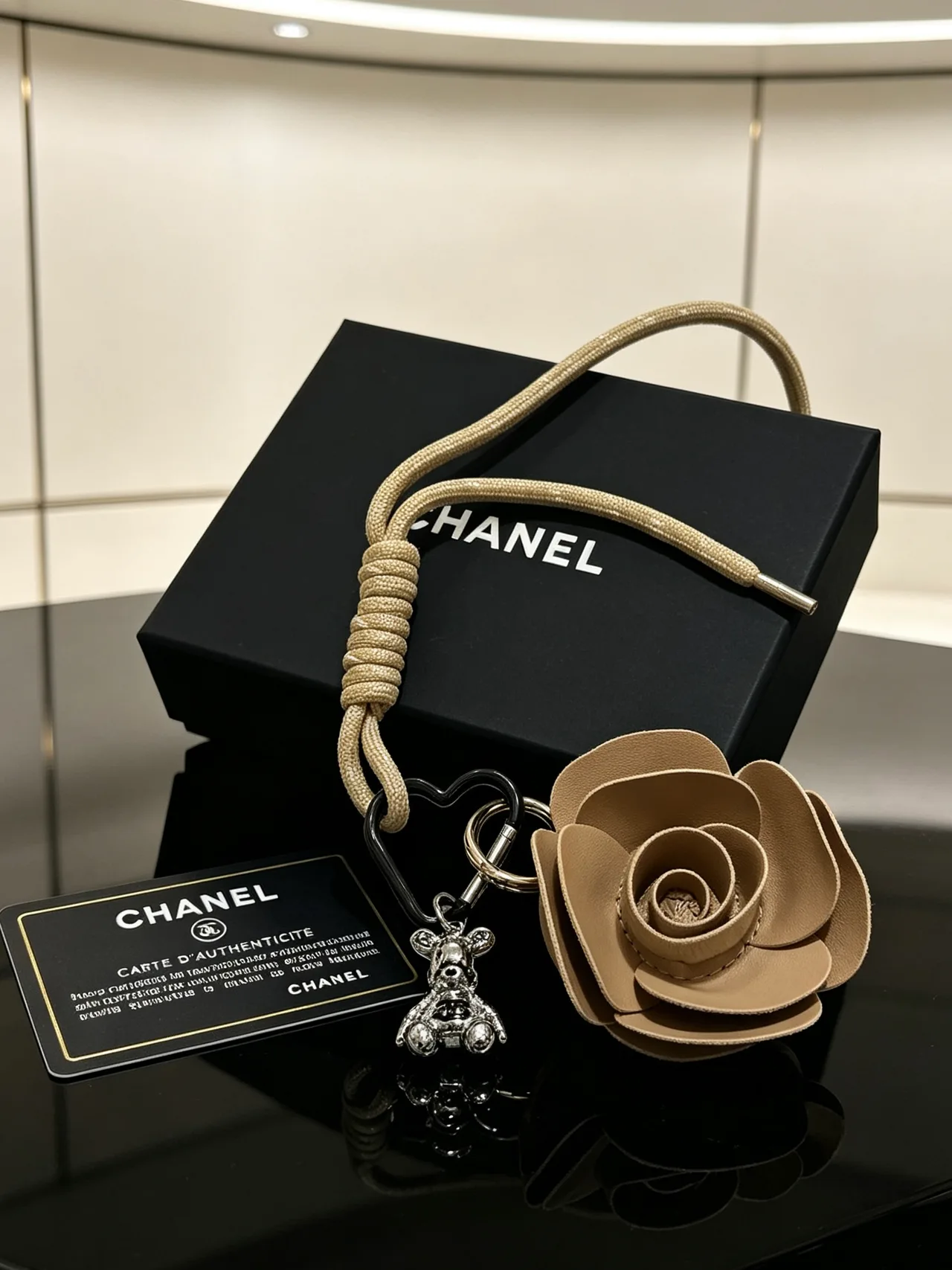 Chanel Woven Rose Keychain in Brown · view 4