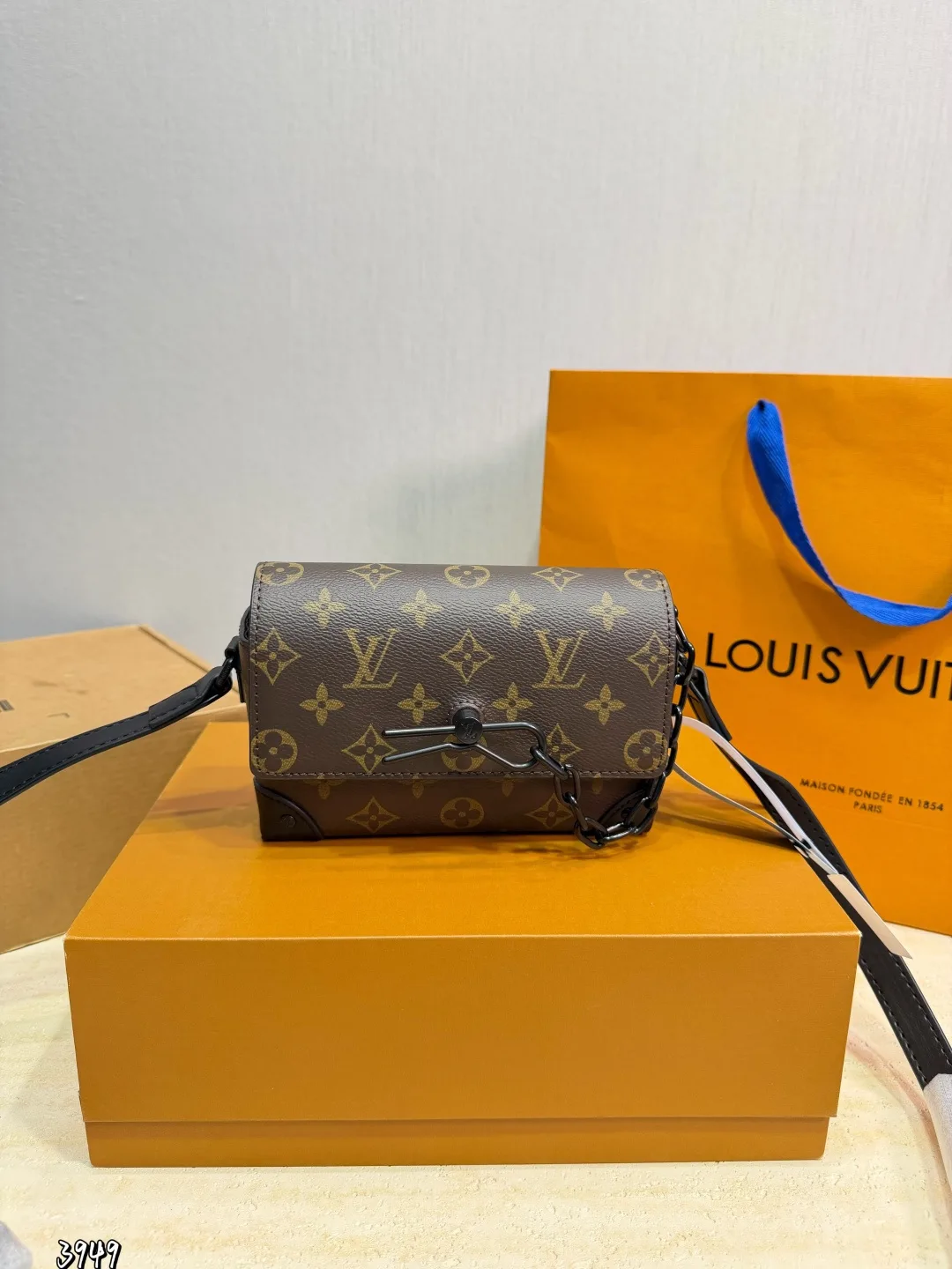 Louis Vuitton Mini Crossbody Bag in Brown · view 1