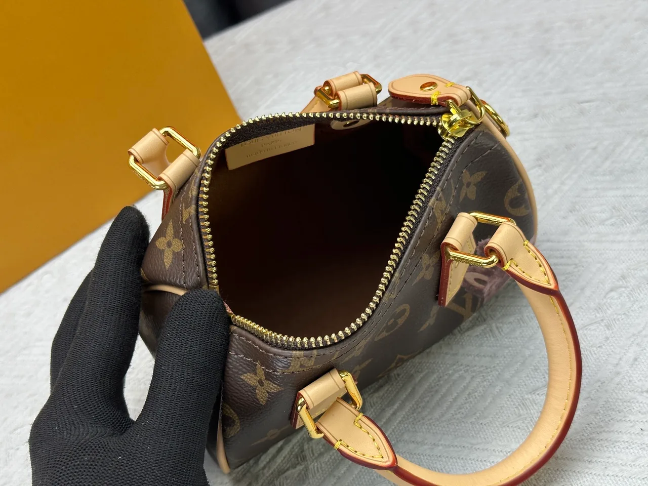 Louis Vuitton Leather Nano Speedy Handbag in Brown · view 9