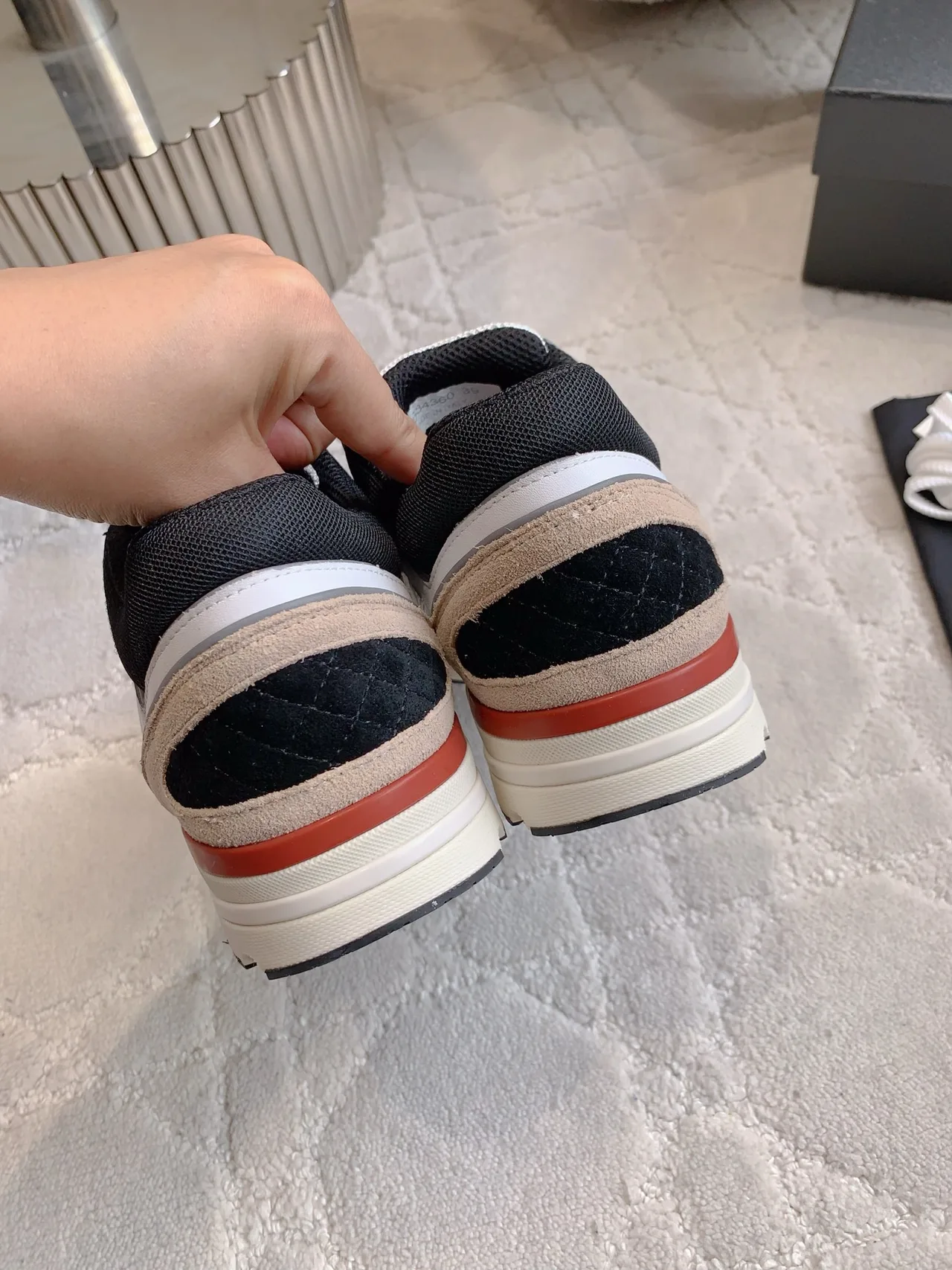Chanel Quilted Sneakers in White · view 5