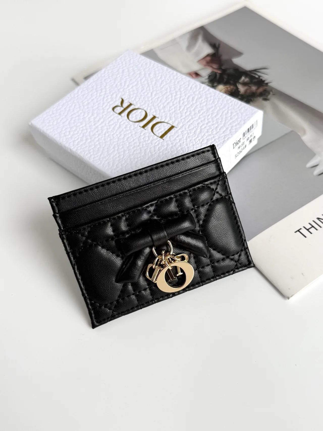 Dior Lambskin Quilted Bow Cardholder in Black · view 1