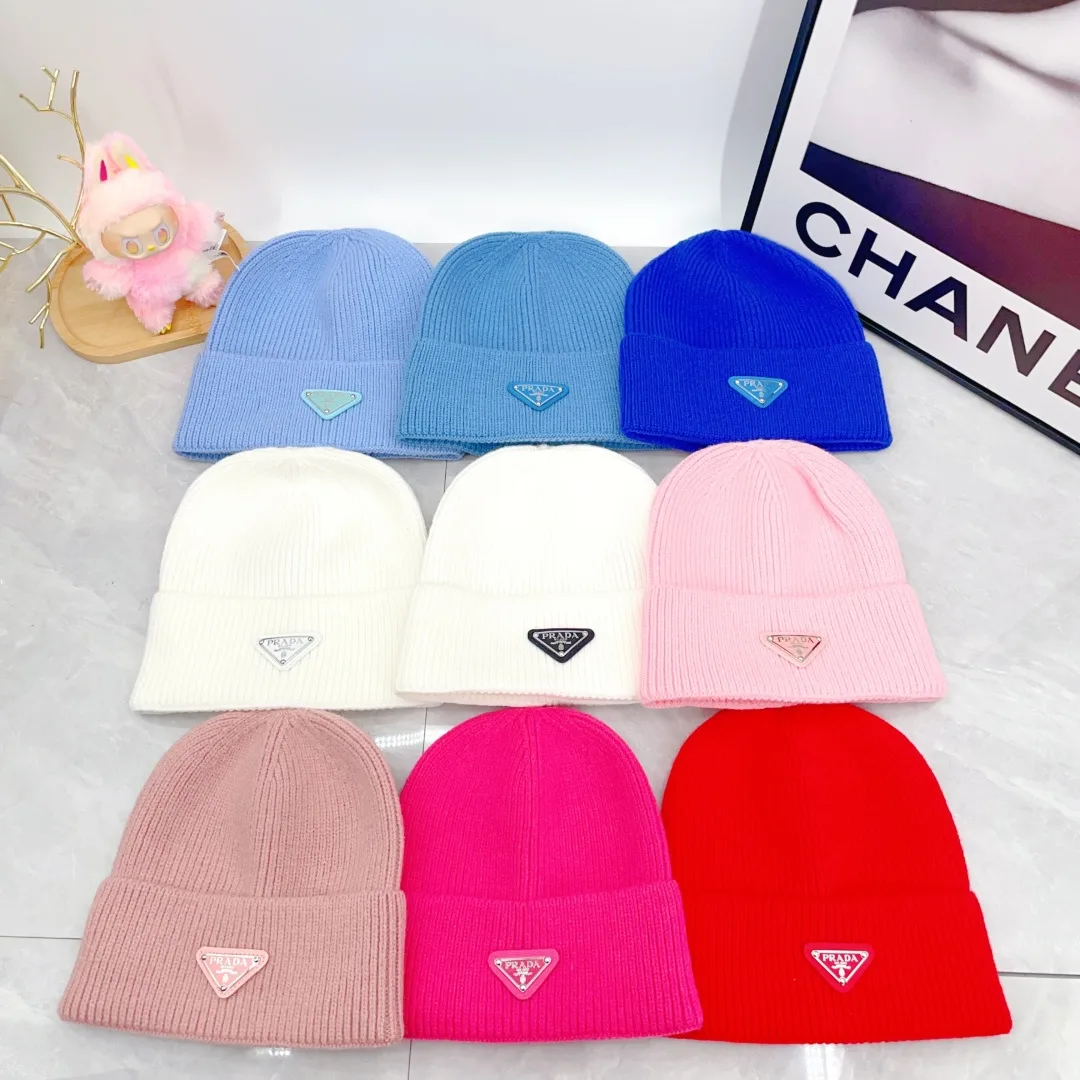 Prada Triangle-Badge Beanie in Black & Grey & White & Beige & Brown & Yellow & Blue & Pink & Red · view 3