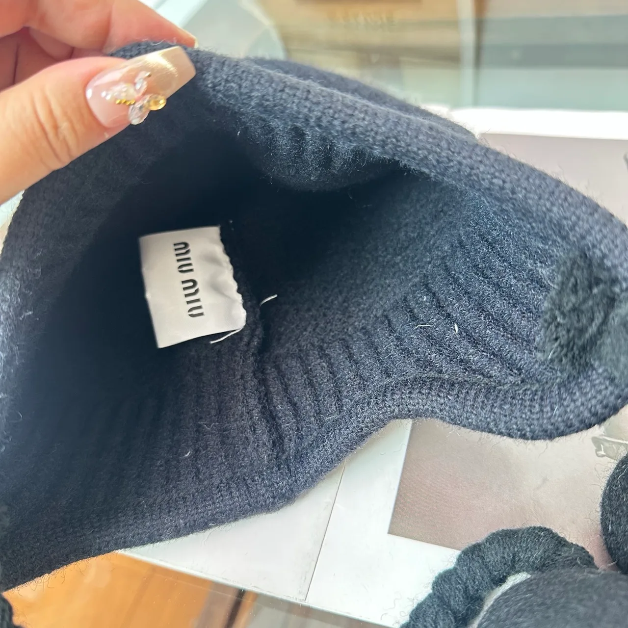 Miu Miu Ribbed Earflap Hat in Black · view 8