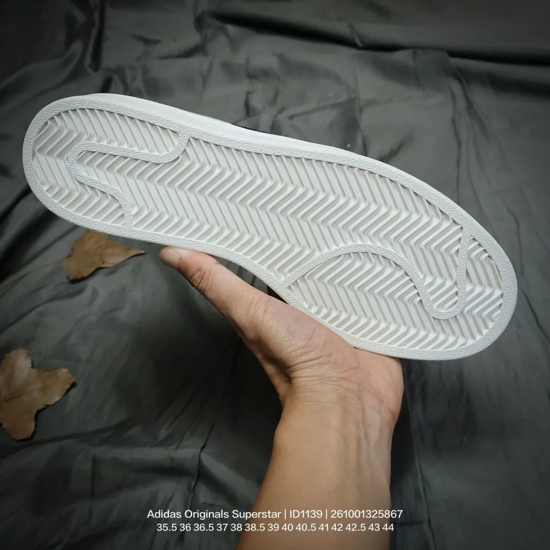 Adidas Striped Low-Top Sneakers in White · view 6