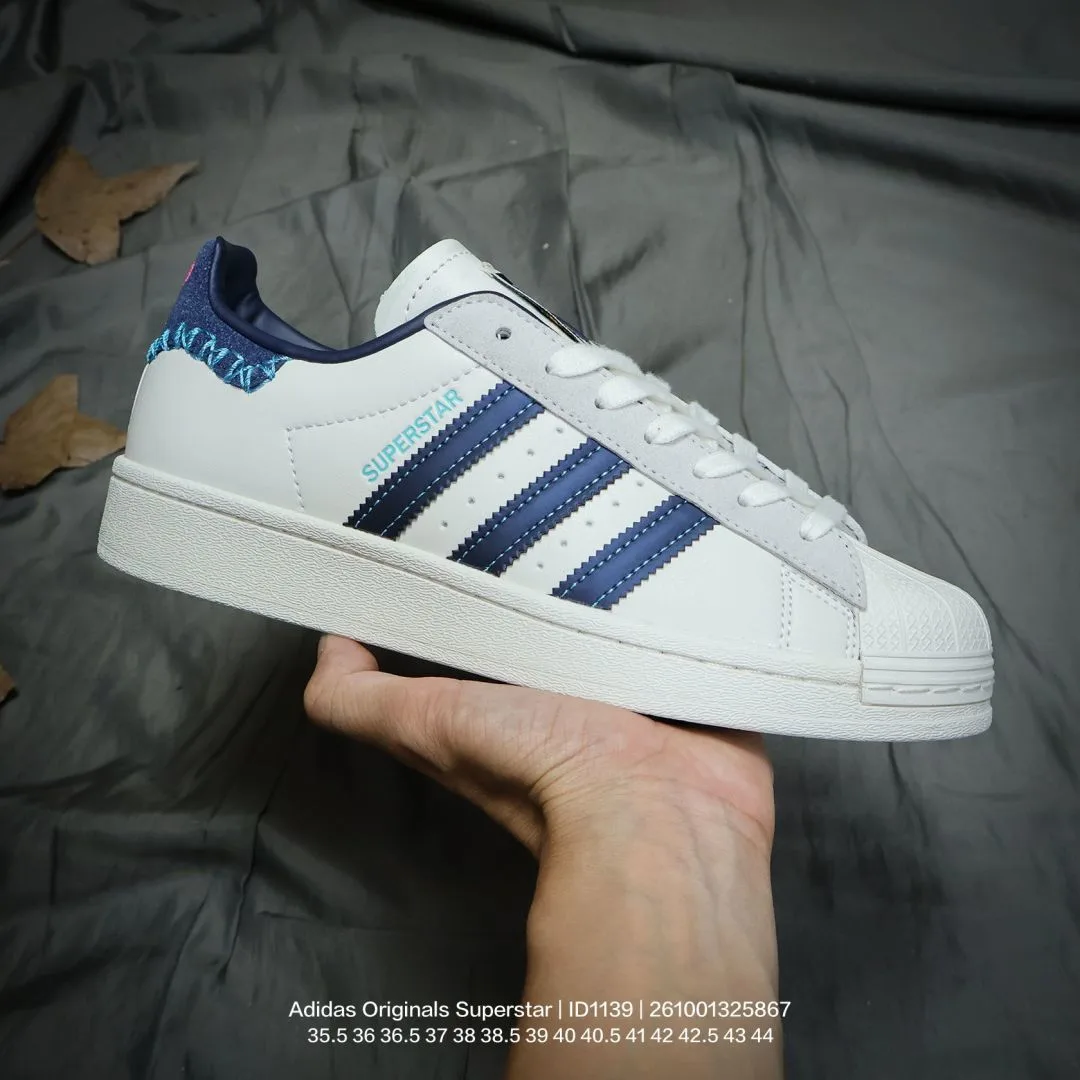 Adidas Striped Low-Top Sneakers in White · view 2