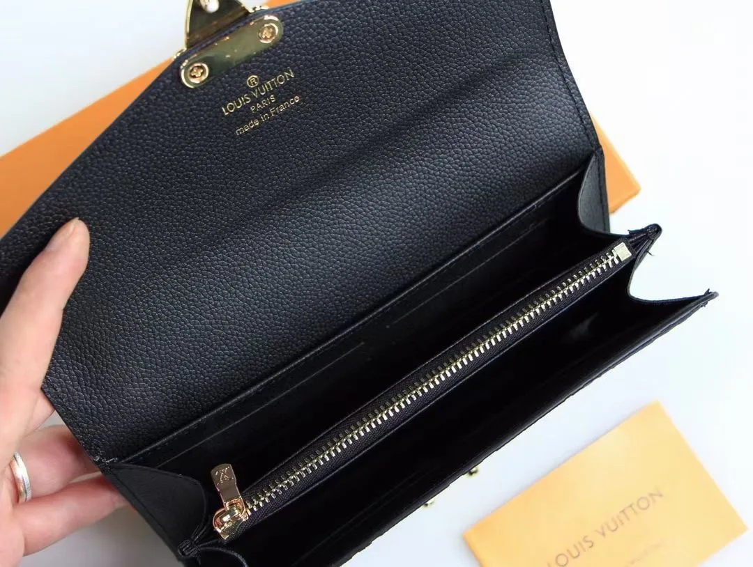Louis Vuitton Cowhide Long Wallet in Black · view 9