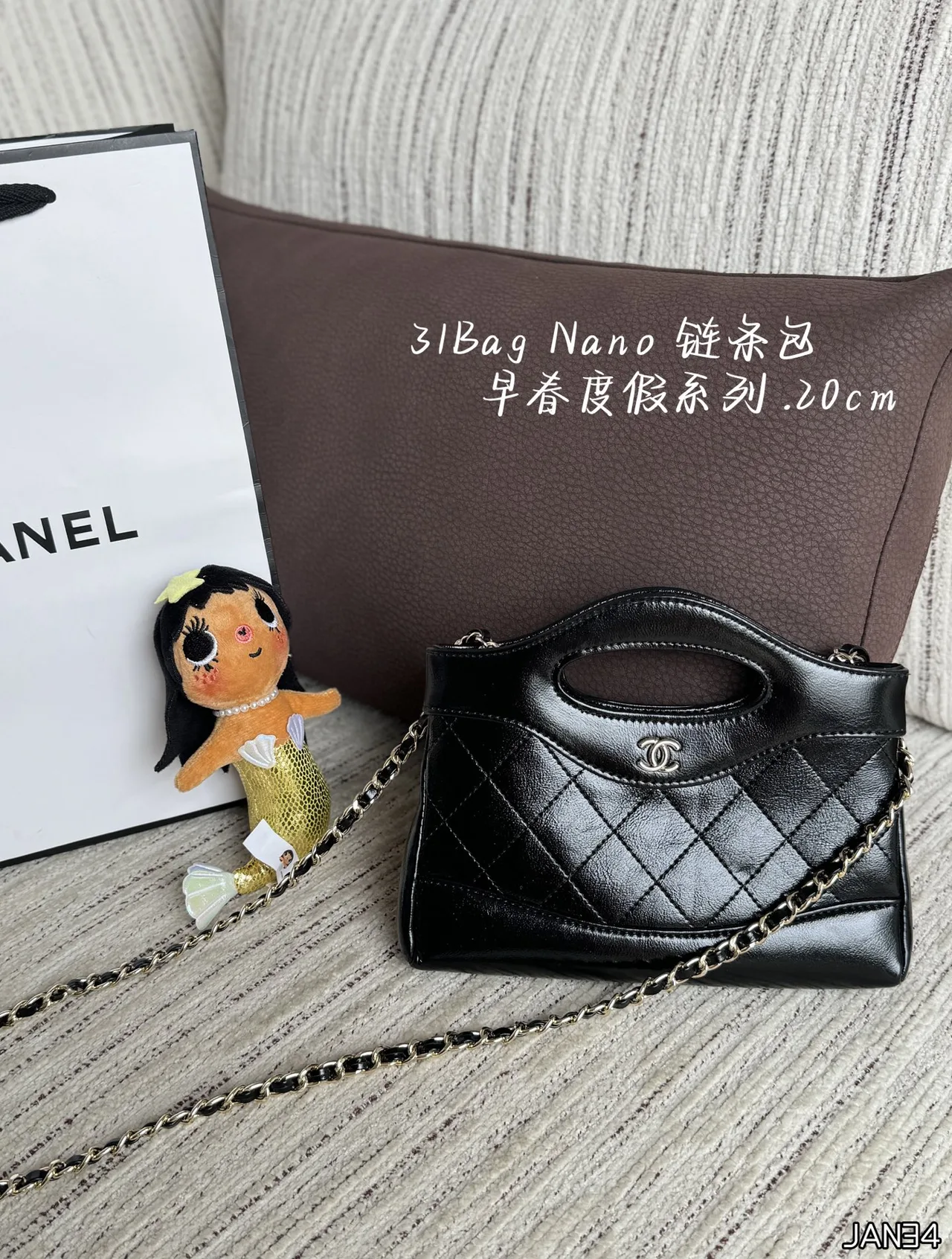 Chanel Quilted Top-Handle Mini Bag in Black · view 1