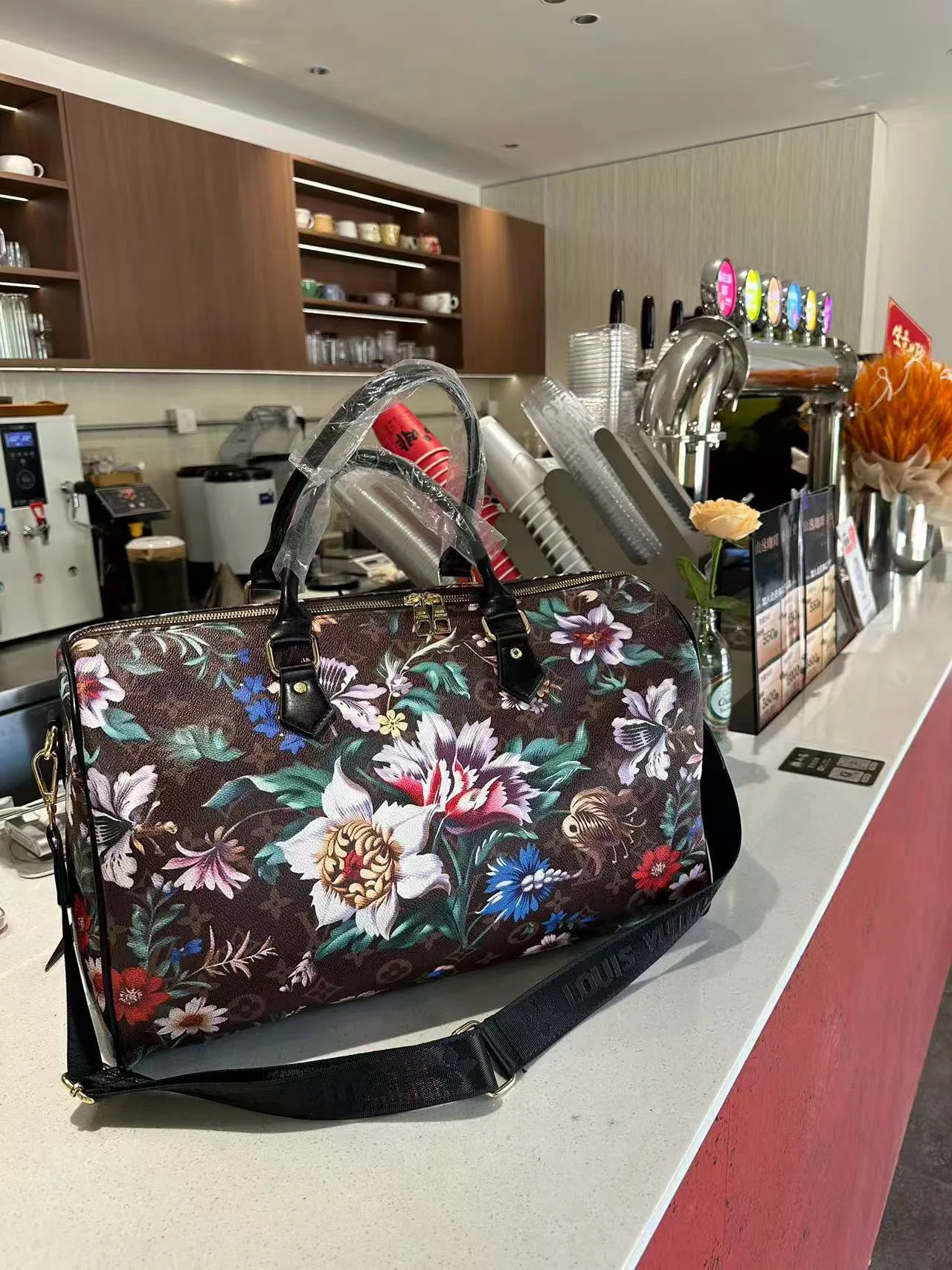 Louis Vuitton Floral Monogram Duffel Bag in Brown · view 4