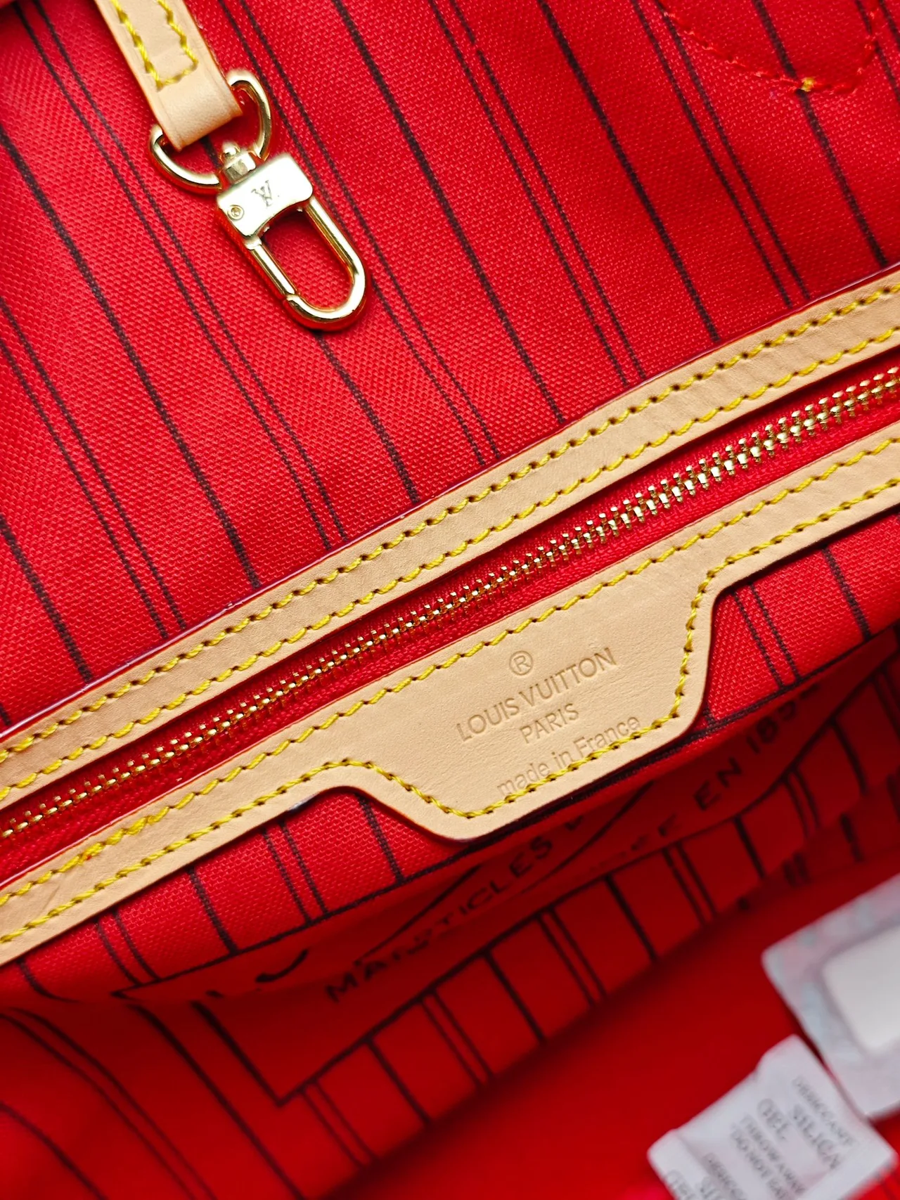 Louis Vuitton Neverfull Clutch in Brown · view 8