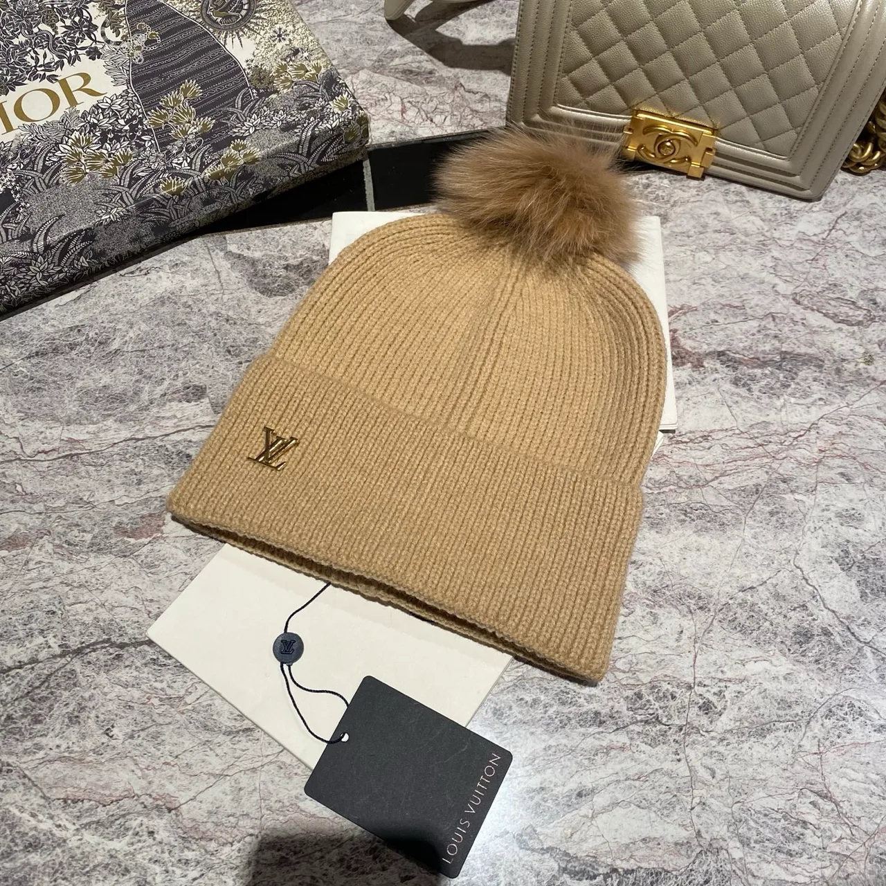 Louis Vuitton Pom-Pom Beanie in Black & White & Blue & Pink & Beige & Grey & Cream & Burgundy & Red & Tan · view 5