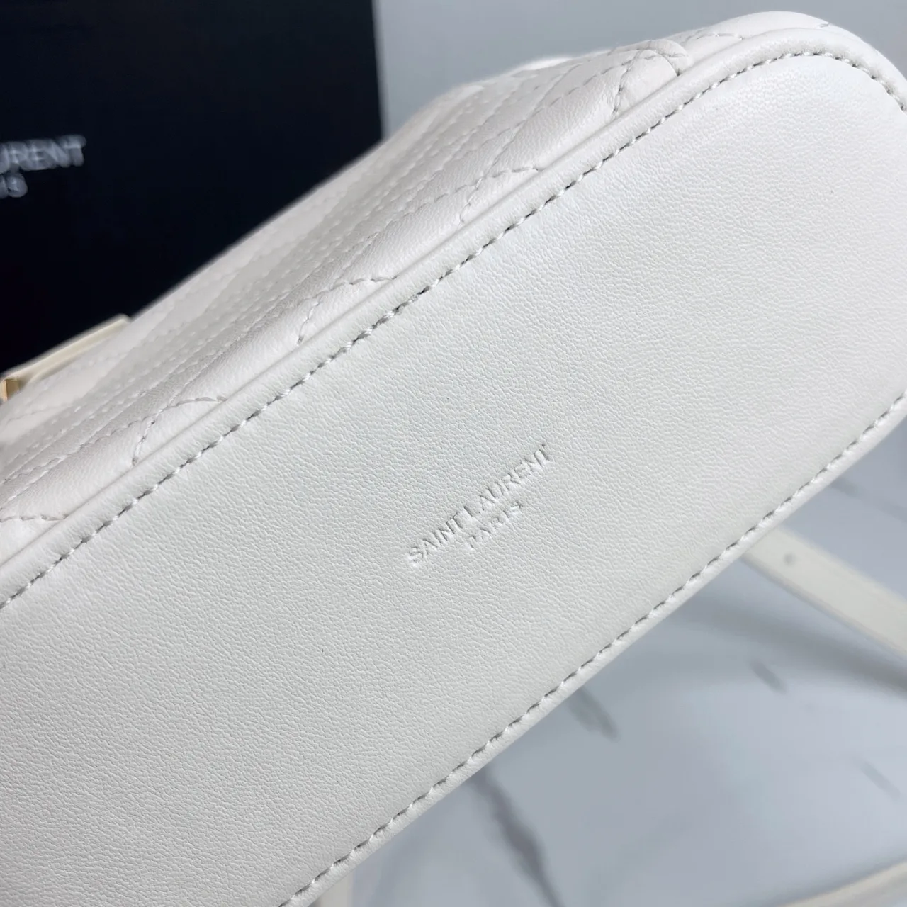 Saint Laurent Quilted Crossbody Bag in White · view 8