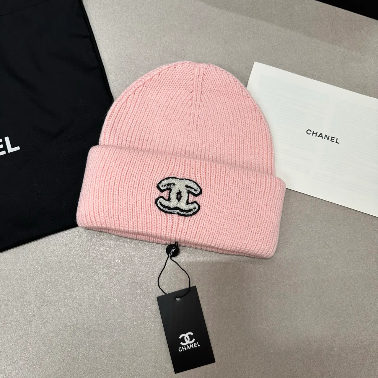 Chanel Knit Beanie in Pink & Burgundy & Black & Beige · view 1