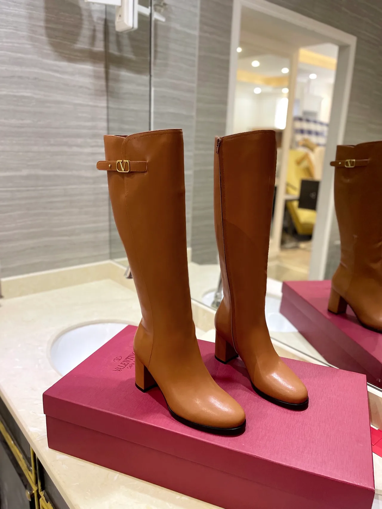 Valentino Leather Glossy Buckle Knee-High Boots in Brown · view 1