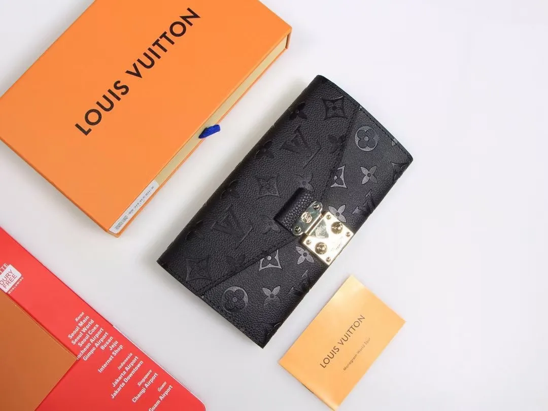 Louis Vuitton Cowhide Long Wallet in Black · view 4