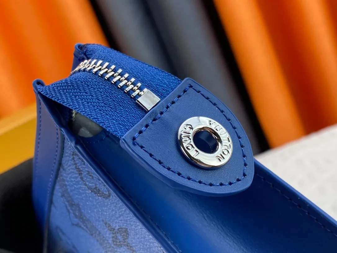 Louis Vuitton Cowhide Canvas Clutch in Blue · view 7
