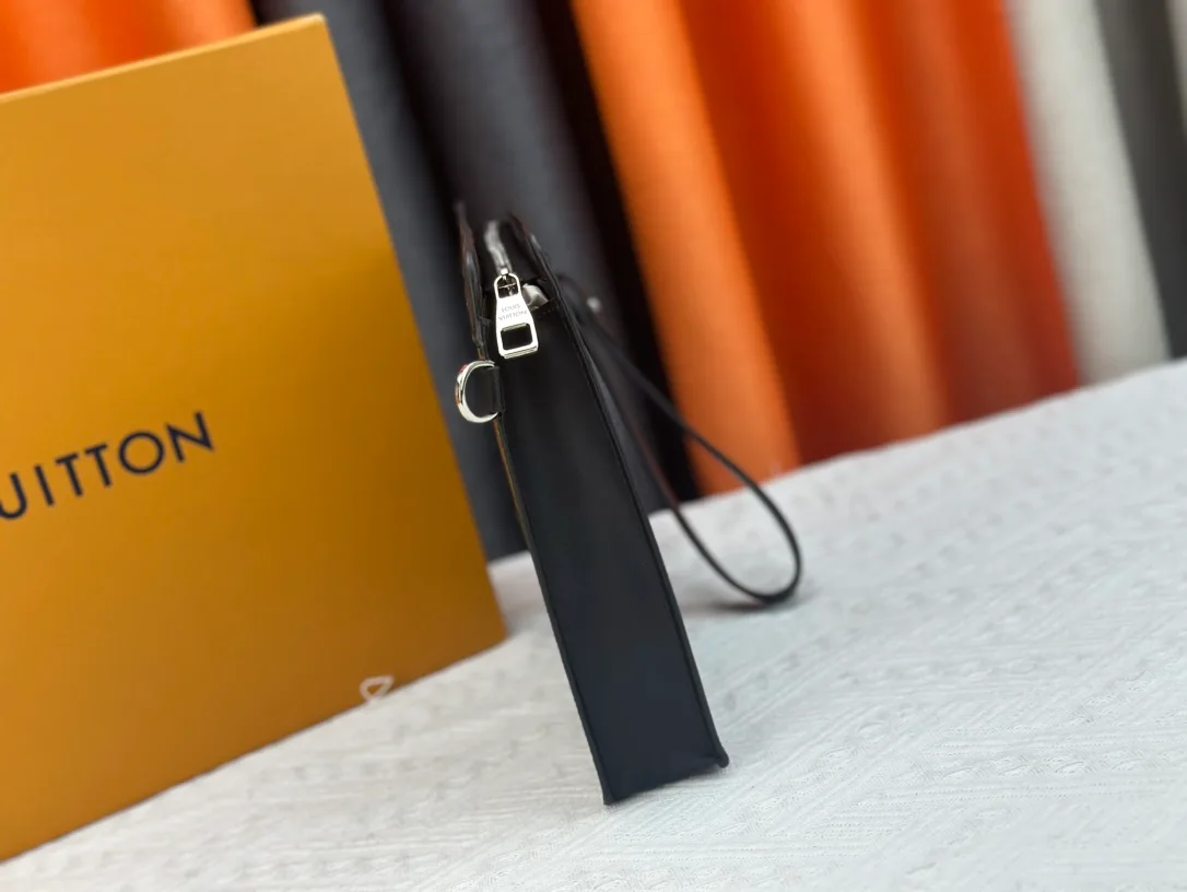 Louis Vuitton Canvas Clutch in Brown · view 5