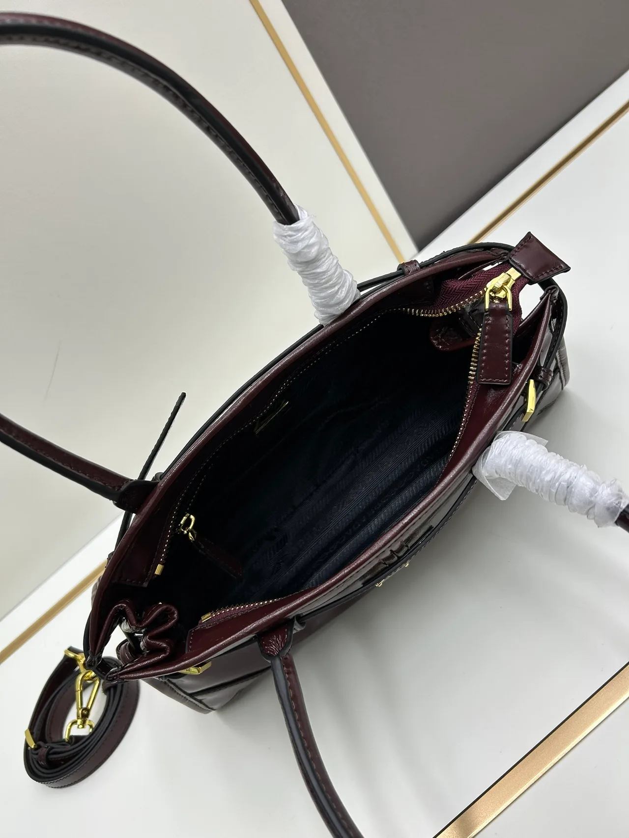 Prada Glossy Top-Handle Bag in Burgundy · view 7