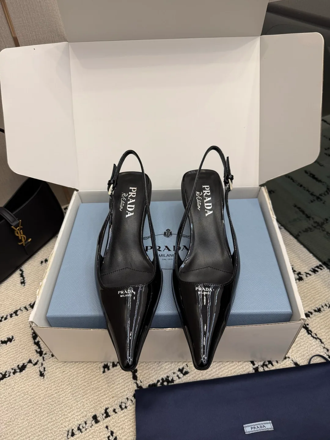 Prada Patent Leather Pointed Slingback Pumps in Black · view 1