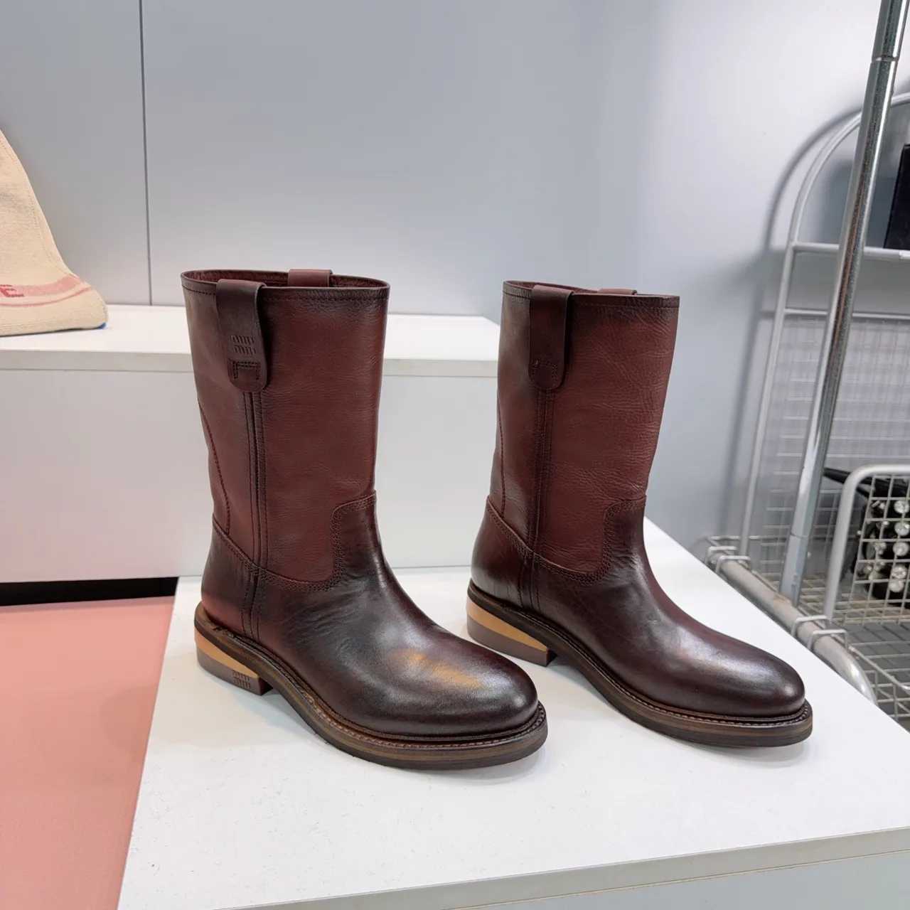 Miu Miu Cowhide Smooth Round-Toe Pull-On Boots in Brown · view 1
