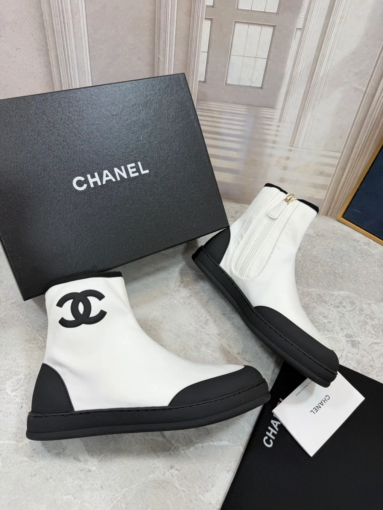 Chanel Cowhide Quilted Glossy Ankle Boots in White · view 2