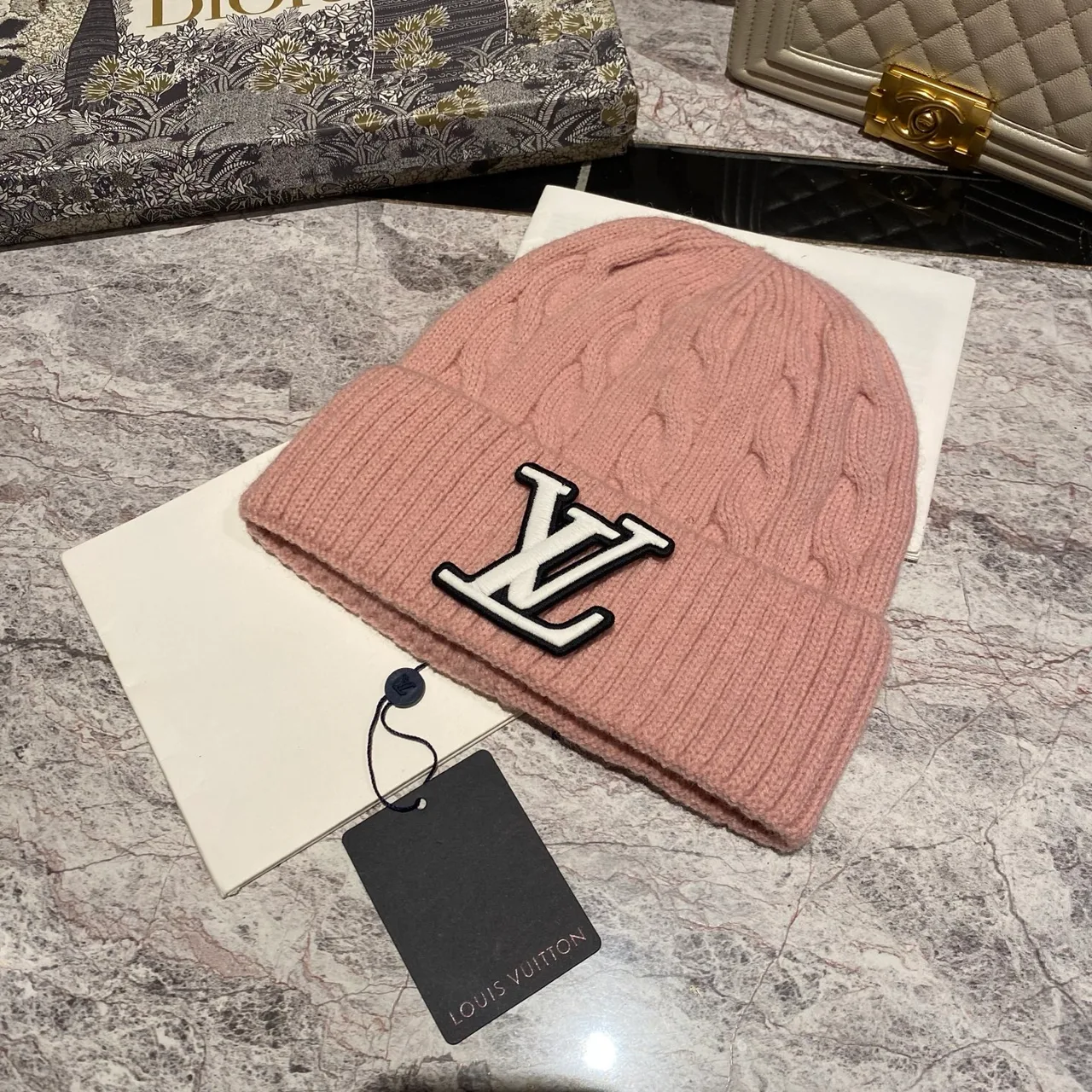 Louis Vuitton Cable Beanie in Pink & Burgundy & Grey & Blue & Beige & White & Brown & Black · view 1