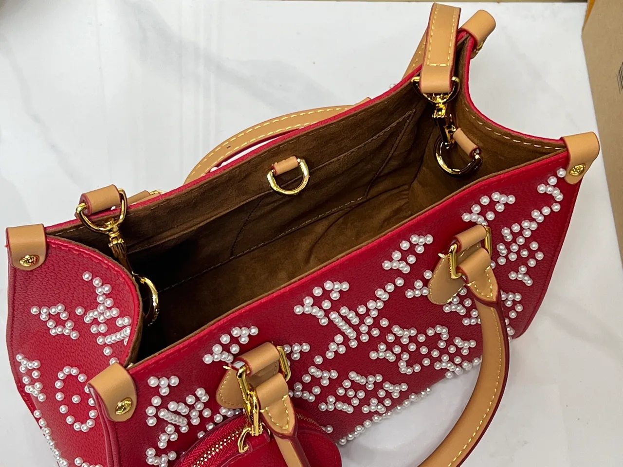Louis Vuitton Cowhide OnTheGo Tote in Red · view 8