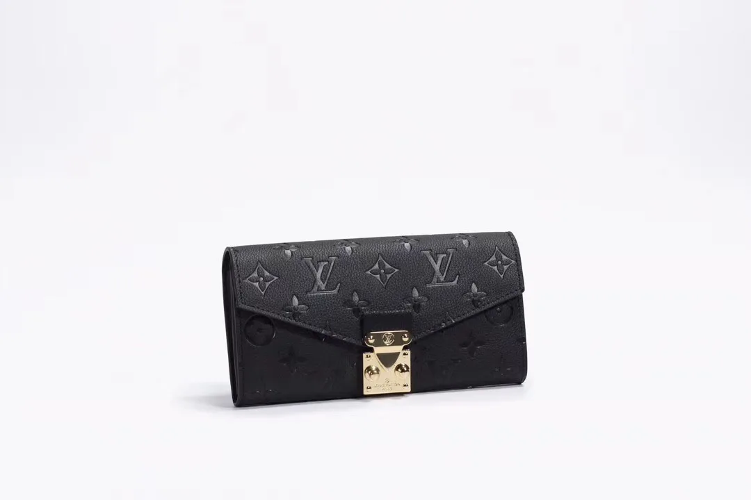 Louis Vuitton Cowhide Long Wallet in Black · view 1