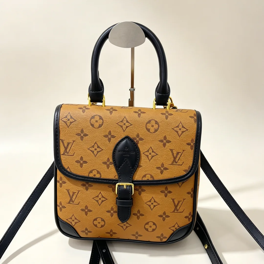 Louis Vuitton Mini Saumur Bag in Brown & Black & Blue & Orange · view 1