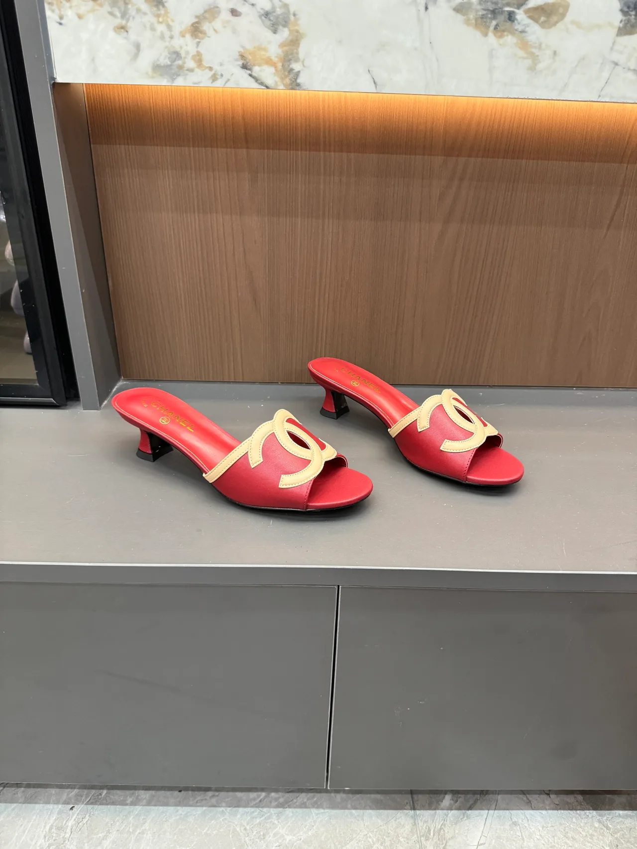 Chanel CC Cutout Heeled Mules in Blue / Pink / White / Yellow · view 2