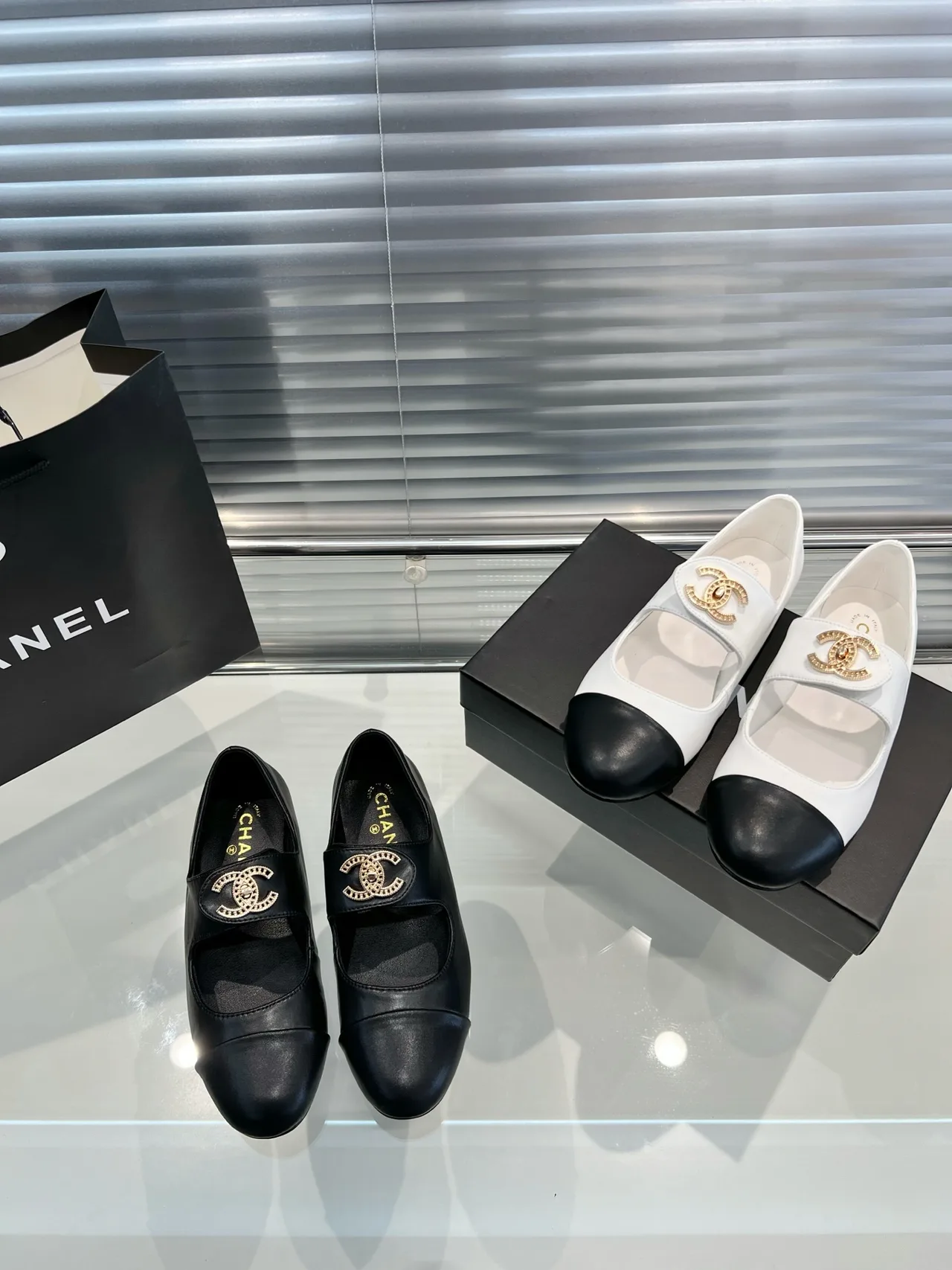 Chanel Cap-toe loafers in Black / Cream · view 1