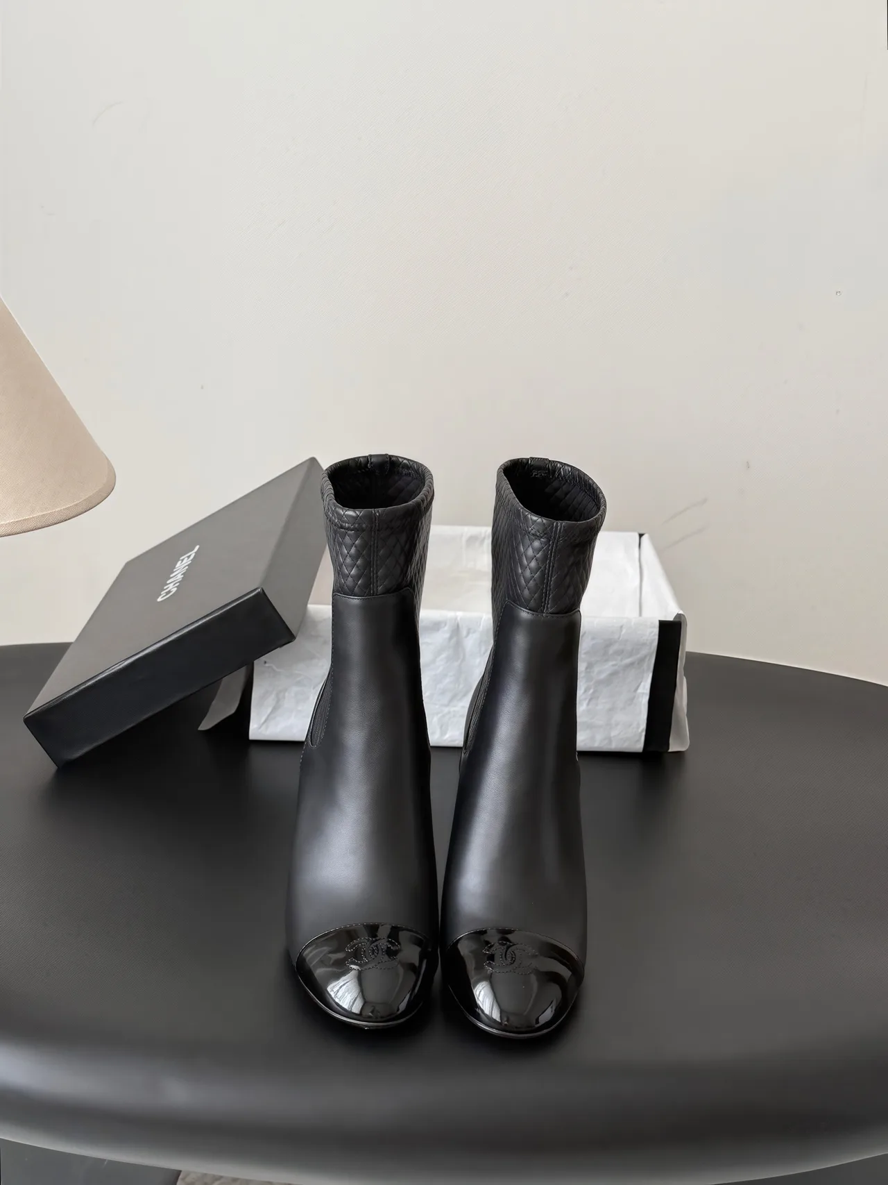 Chanel Cowhide Woven Glossy Pointed-Toe Ankle Boots in Black · view 1