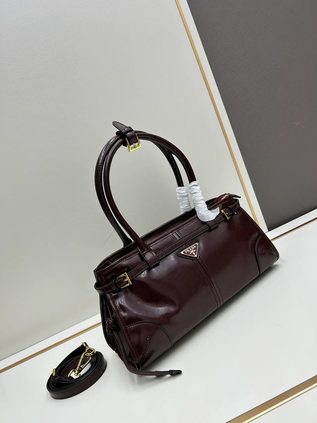 Prada Glossy Top-Handle Bag in Burgundy · view 2