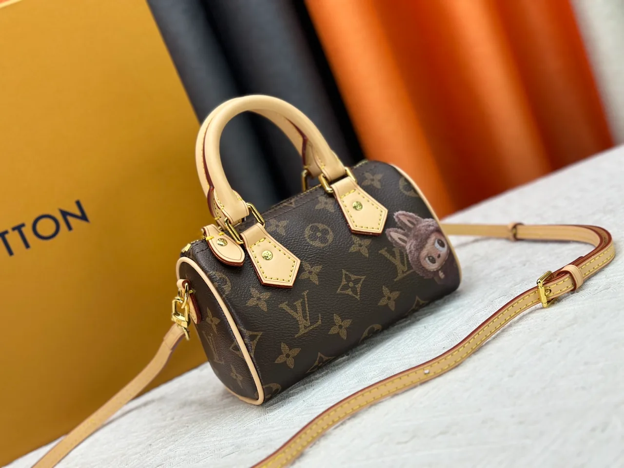 Louis Vuitton Leather Nano Speedy Handbag in Brown · view 2