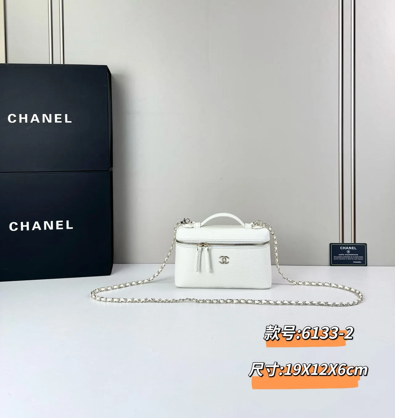 Chanel Cowhide Glossy Top-Handle Clutch in White · view 2