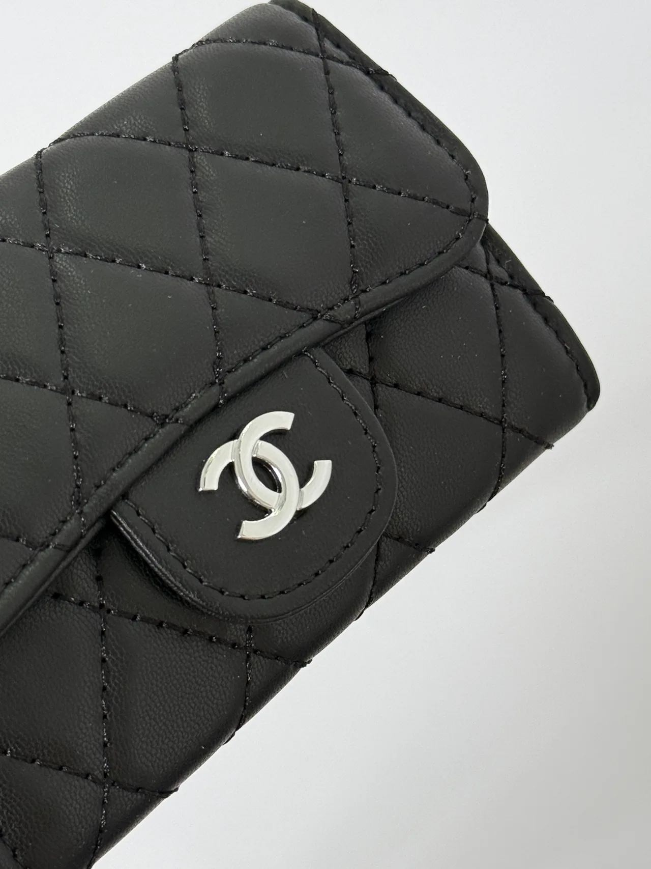 Chanel Quilted Glossy Handbag in Black · view 4