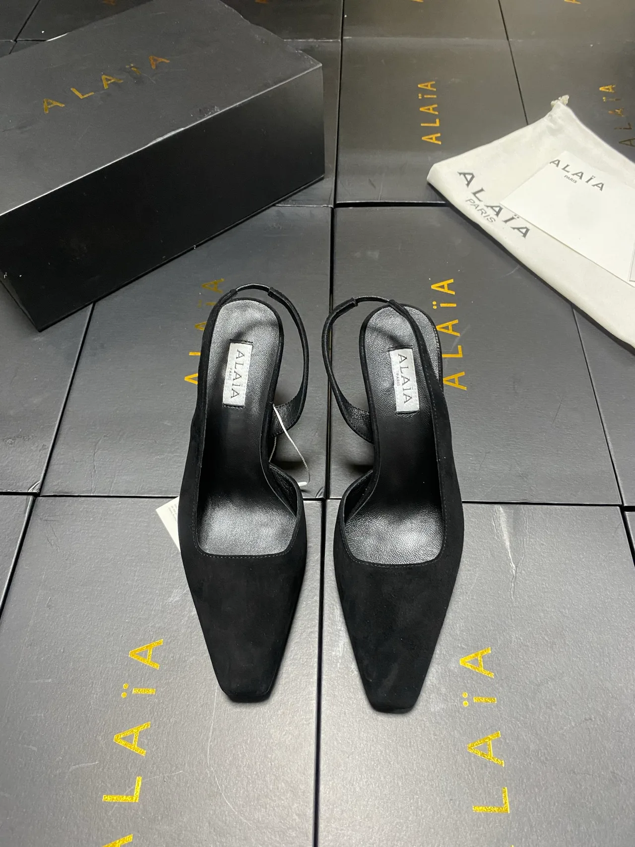 Alaia Square-Toe Slingback Pumps in Black · view 1
