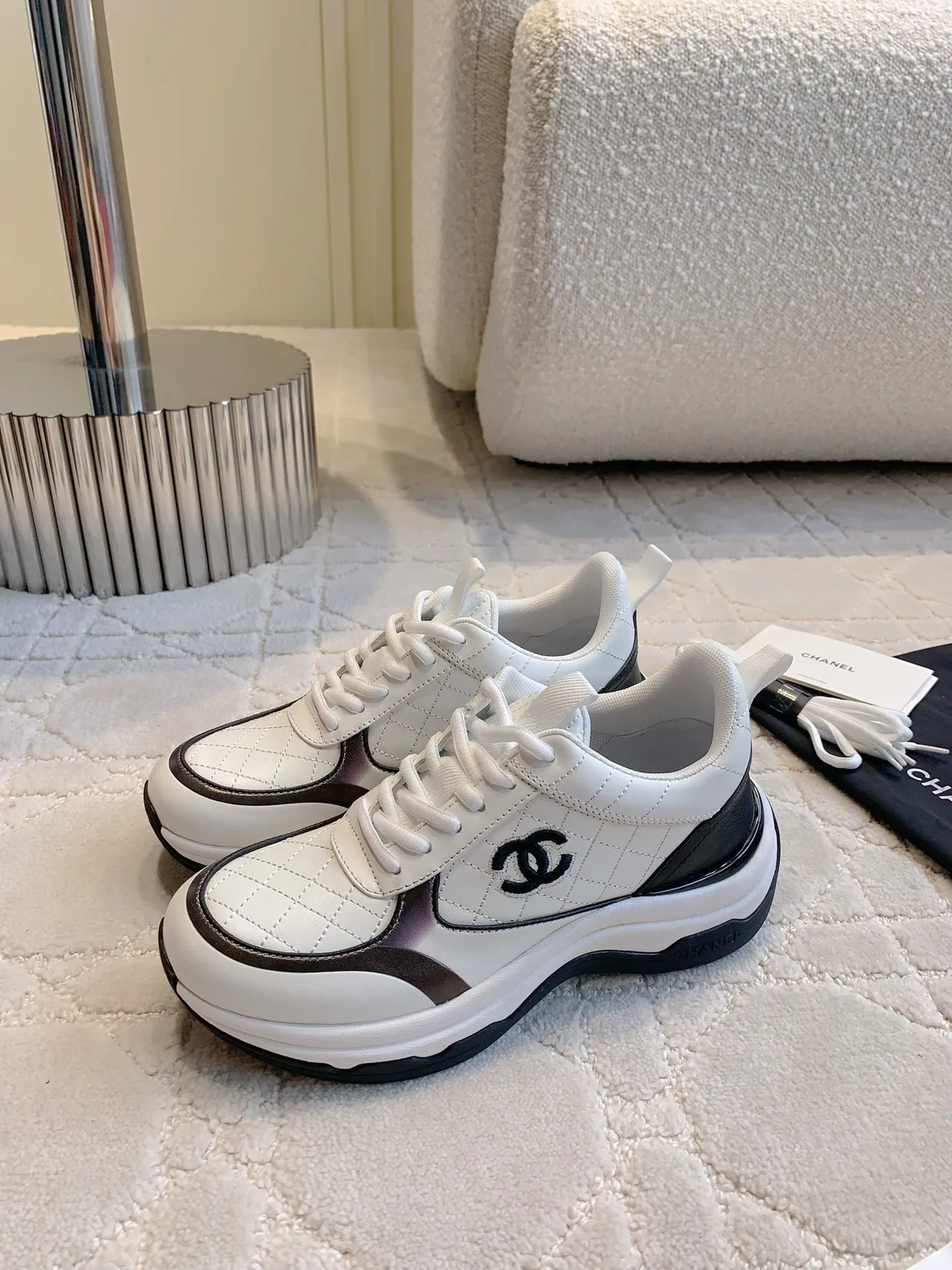 Chanel Quilted Sneakers in White · view 2