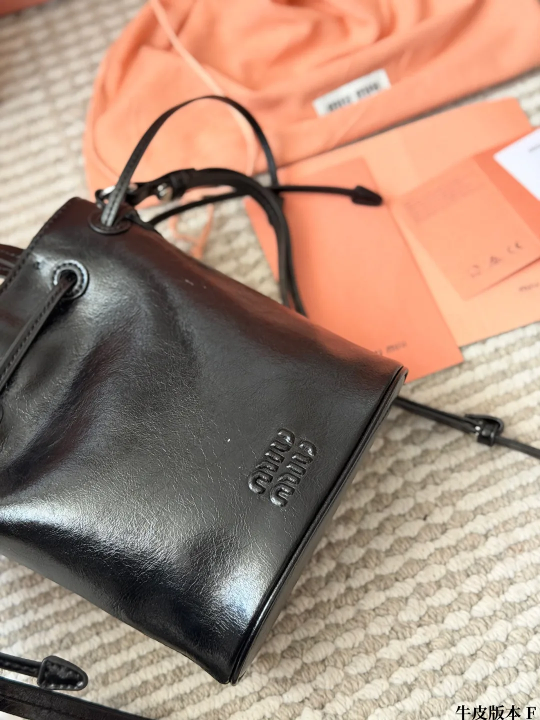 Miu Miu Cowhide Bucket Bag in Black · view 8