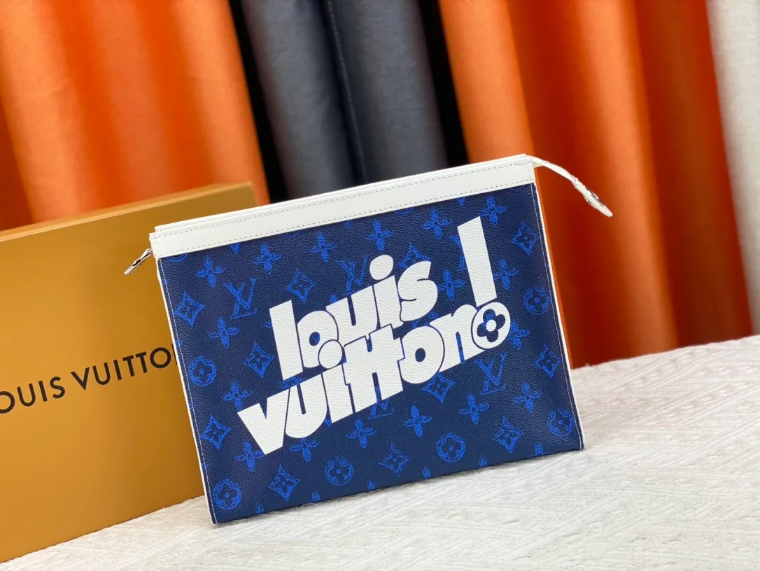 Louis Vuitton Cowhide Canvas Clutch in Blue · view 1