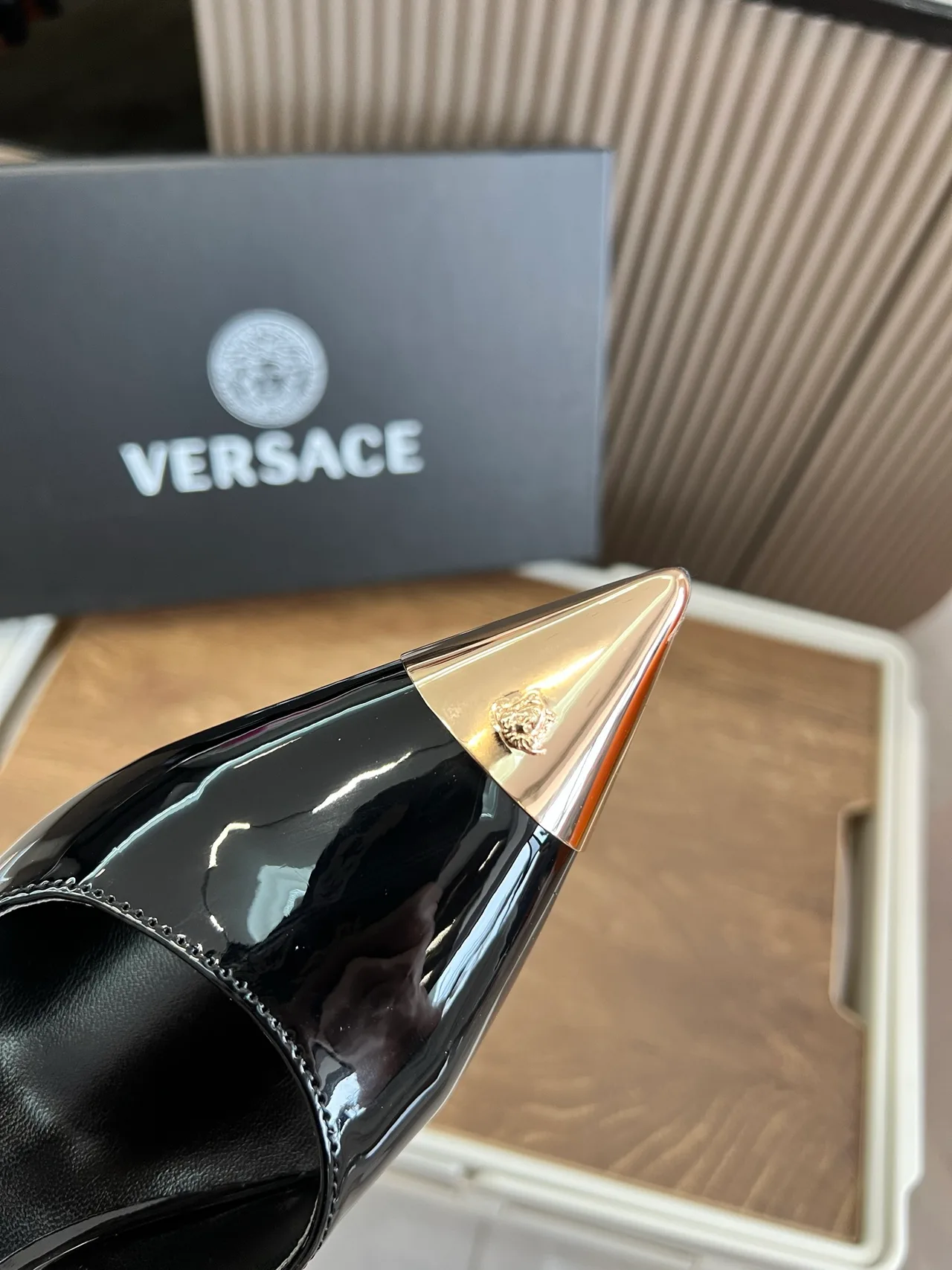 Versace Glossy Pointed-Toe Pointed Slingback Pumps in Black · view 6