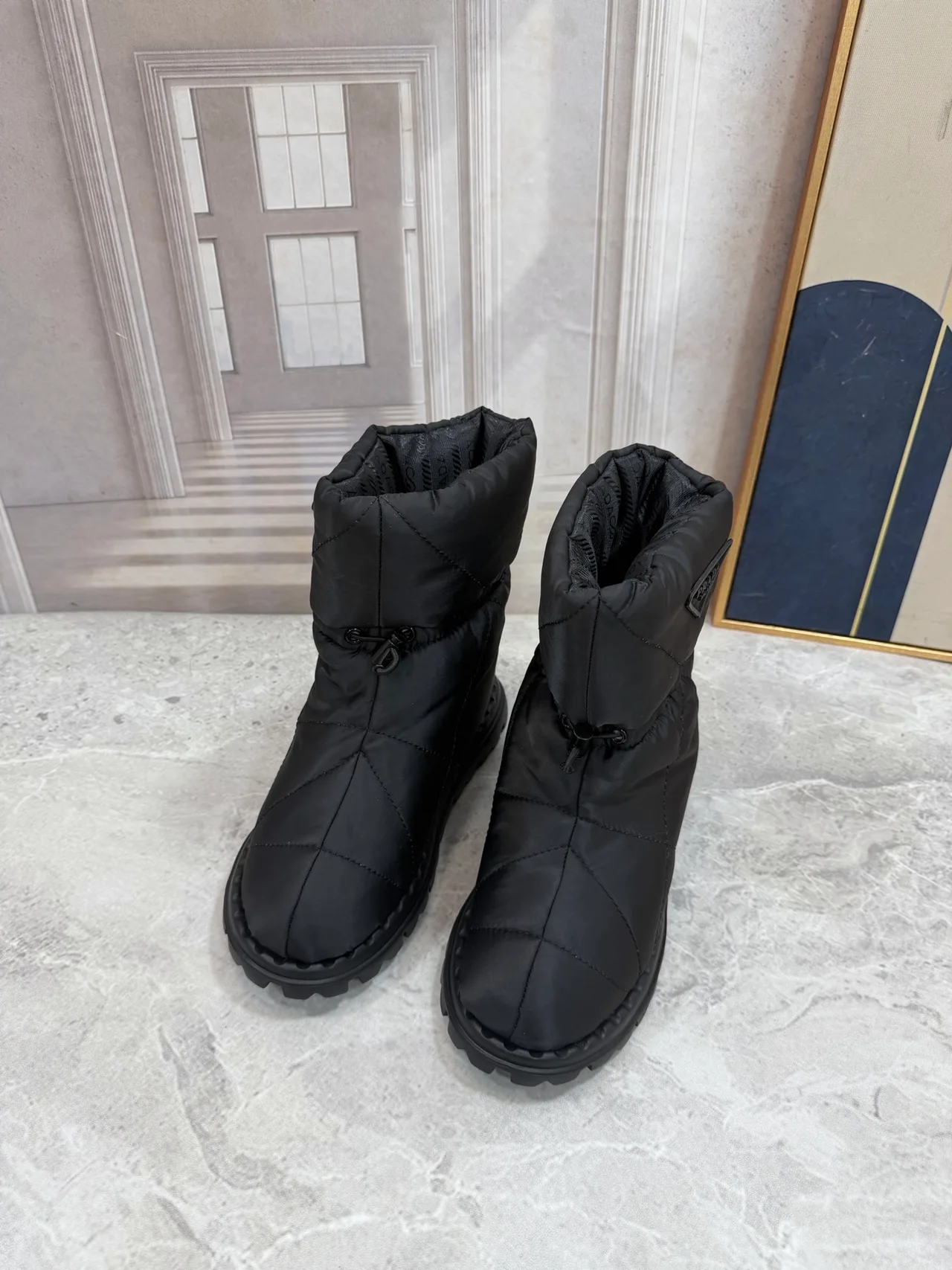 Prada Puffer Boots in Black · view 7