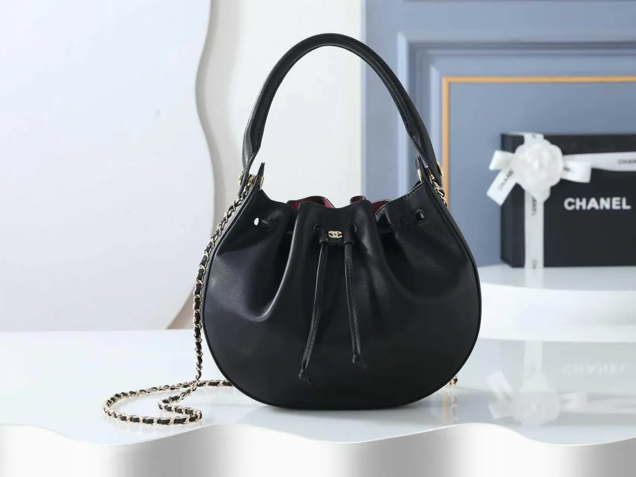 Chanel Woven Bucket Bag in Black · view 1