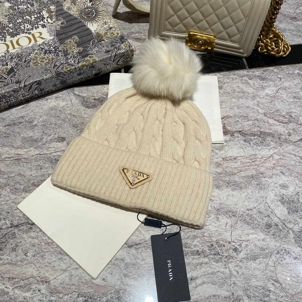 Prada Cable knit pom beanie in Black & White & Grey & Brown & Cream & Blue & Burgundy & Pink · view 5